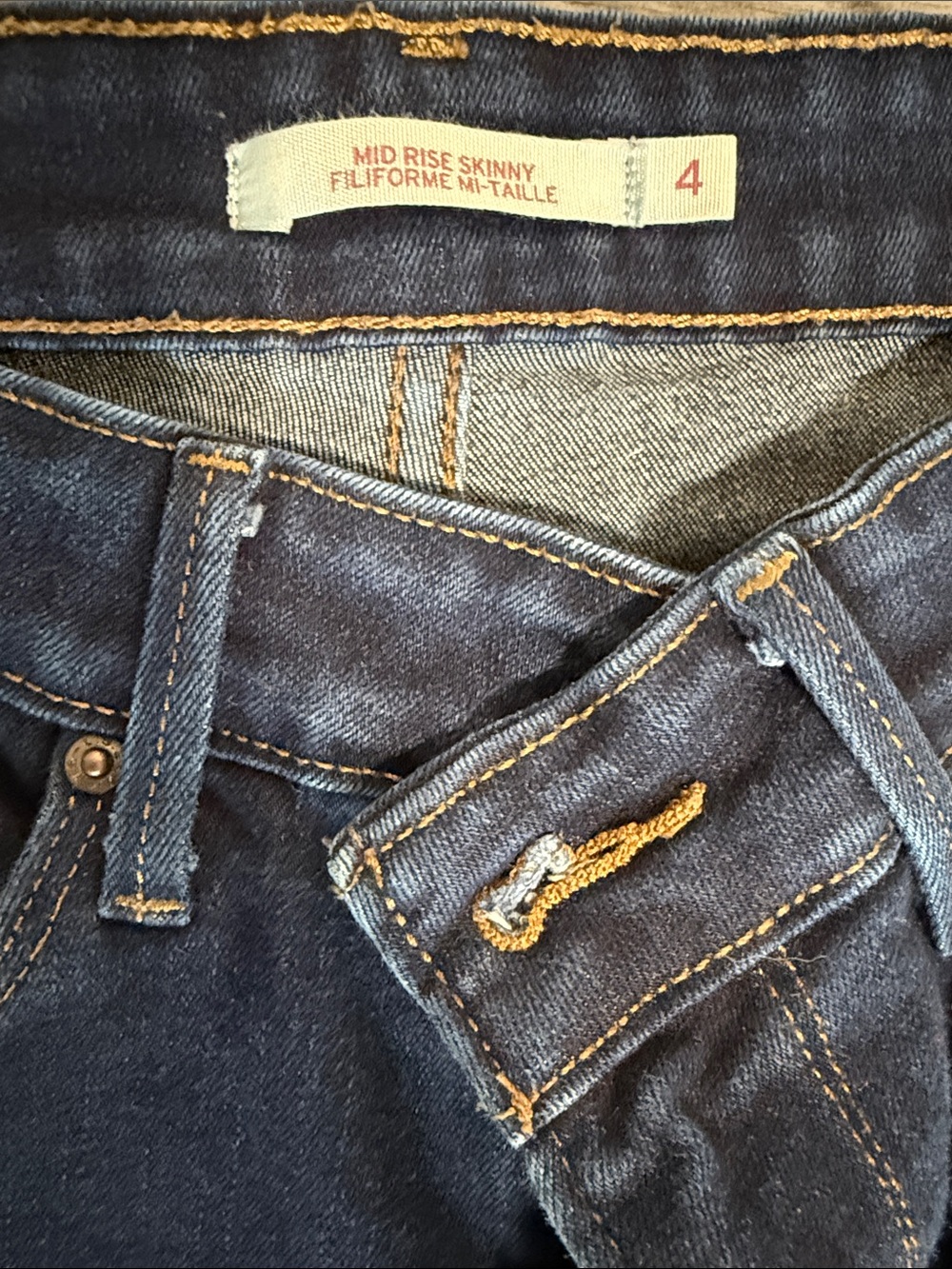 Levi's Mid Rise Skinny Jeans in Dark Blue with Gold Stitching